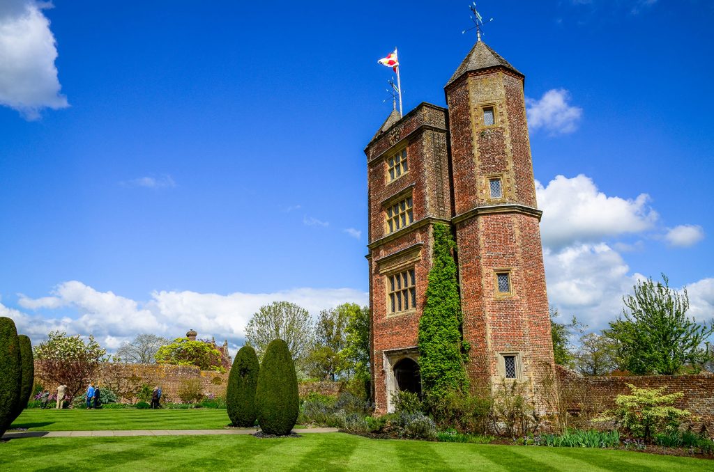 Tourists and visitors enjoy the famous gardens created by Vita Sackville-West near Cranbrook in Kent, England
